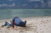 Man with head in sand because he didn't get the best Asset Protection Strategies.